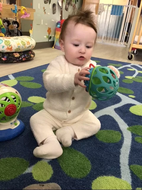 Baby playing with ball